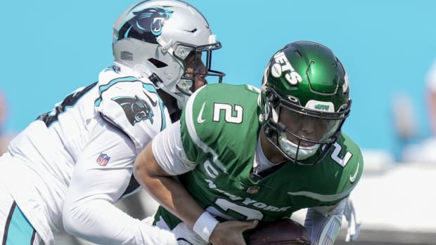 Jets QB Zach Wilson sacked by Carolina Panthers defender